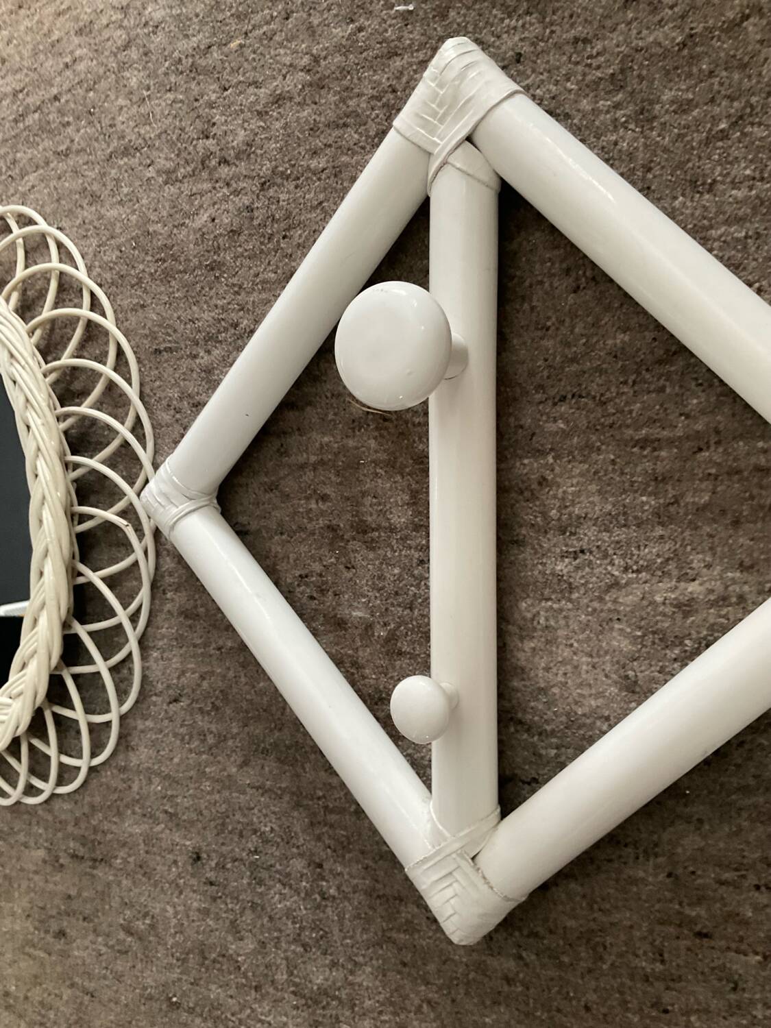 Rattan entrance set with mirror and 2 coat hooks.