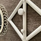 Rattan entrance set with mirror and 2 coat hooks.