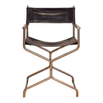 Folding cantilever chair in tubular metal