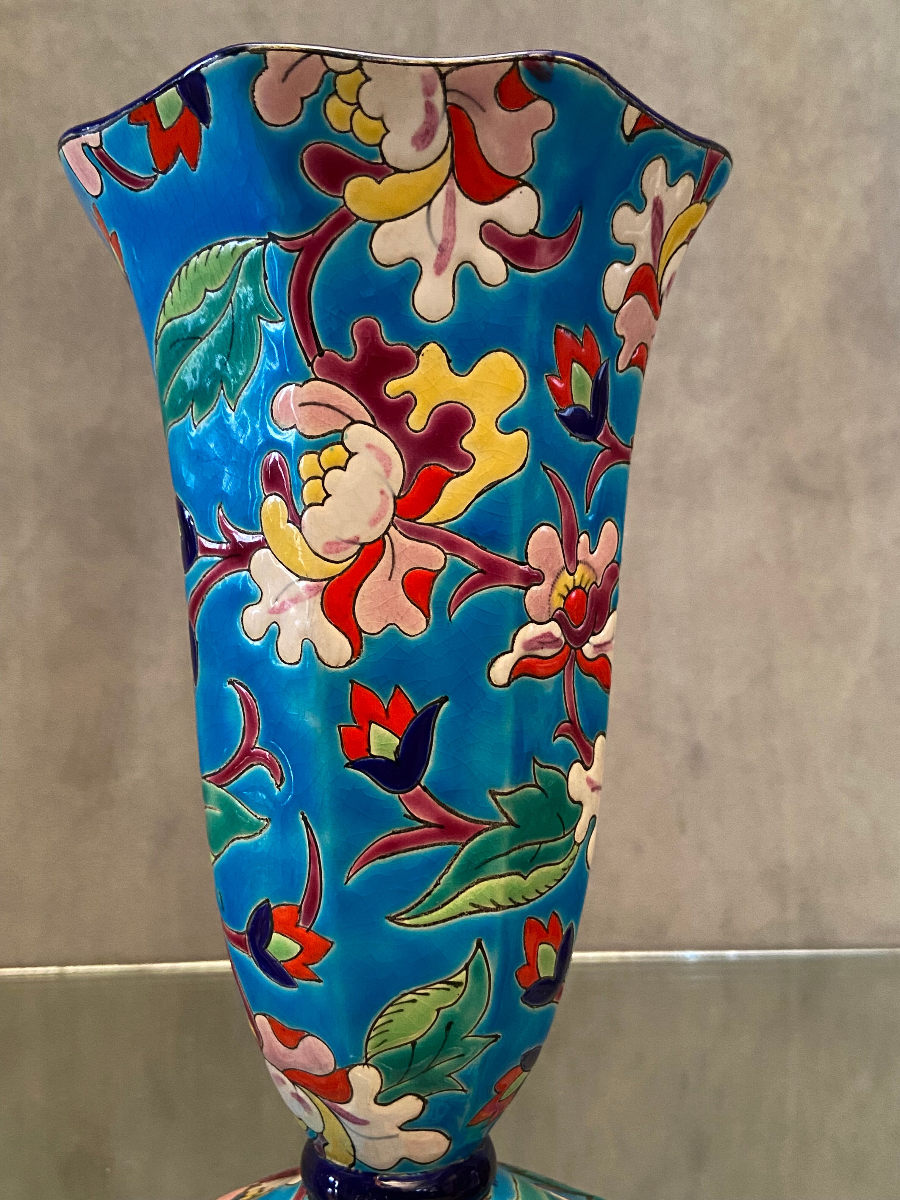 Faience cornet vase with floral decoration signed Emaux de Longwy