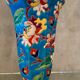Faience cornet vase with floral decoration signed Emaux de Longwy