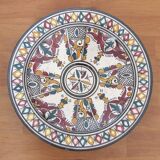 Ceramic dish decorated with yellow and purple decoration