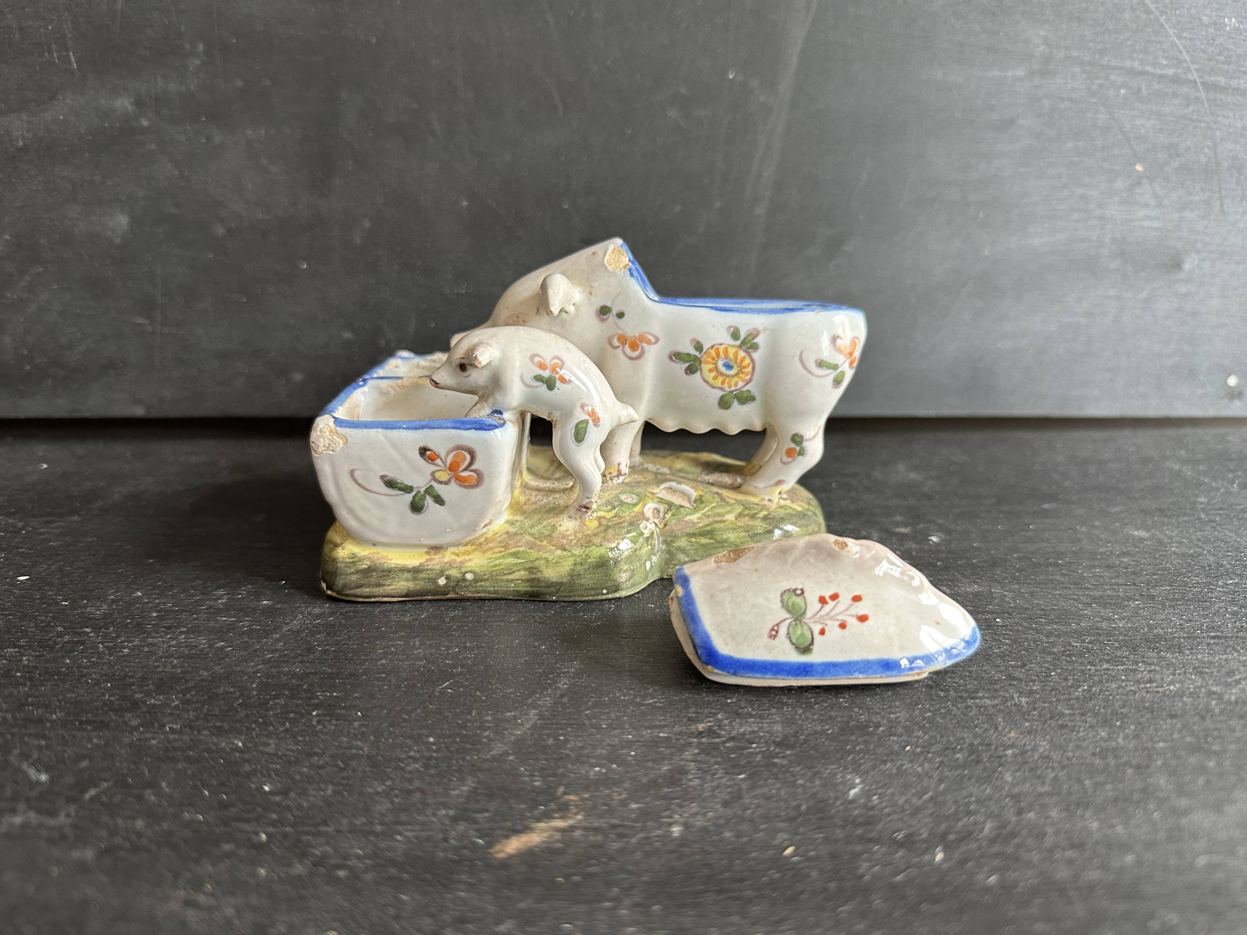 Antique earthenware pig box, salt cellar or mustard pot, floral decoration.