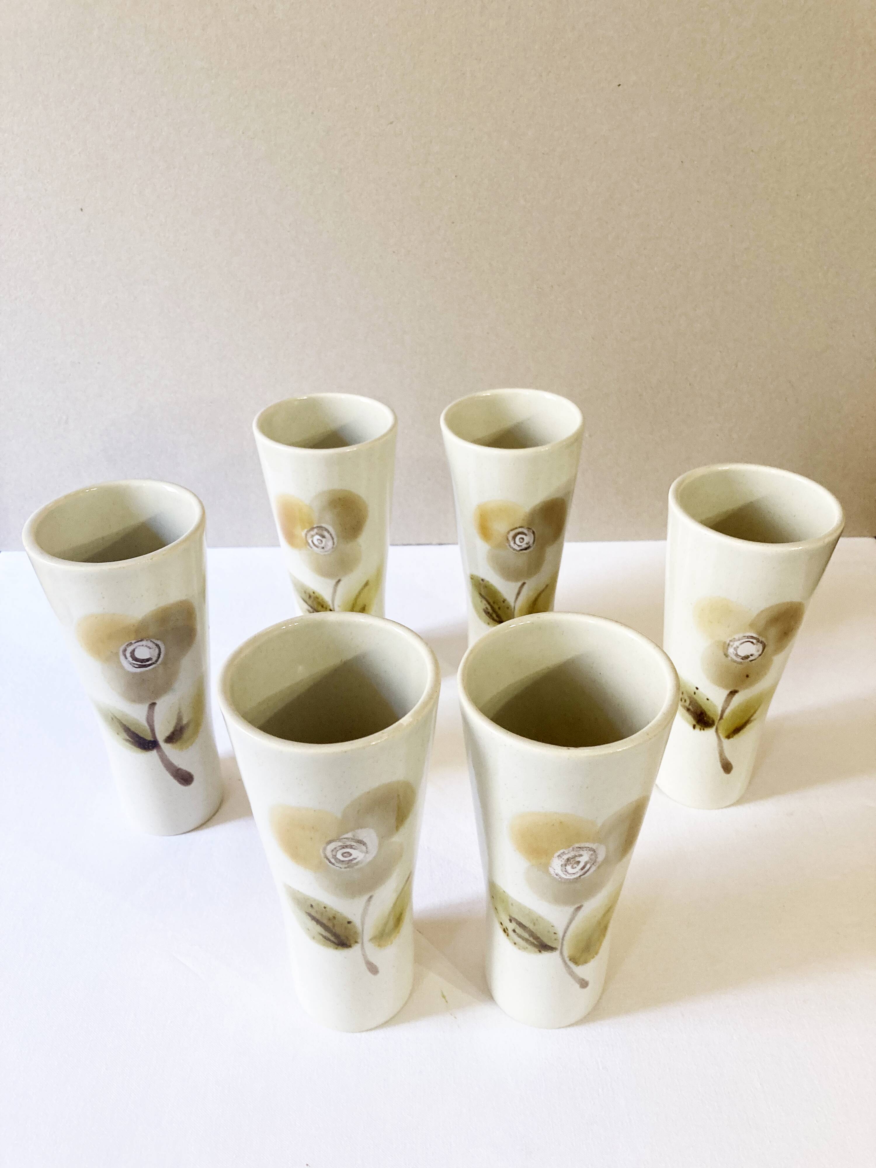 Large ceramic glasses, hand-painted flower pattern, beige/cream tones