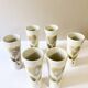 Large ceramic glasses, hand-painted flower pattern, beige/cream tones