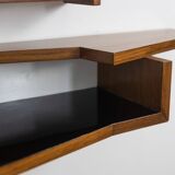 Mirror and its console in mahogany. 1970s.