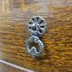 Antique chest of drawers on wheels with wood carving (key top drawer)