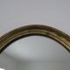 Old oval mirror in gilded wood 50s 60s