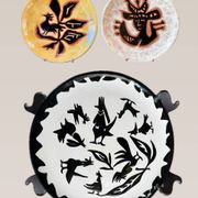 Terracotta plate, Jean Lurçat decorated with a rooster and foliage.