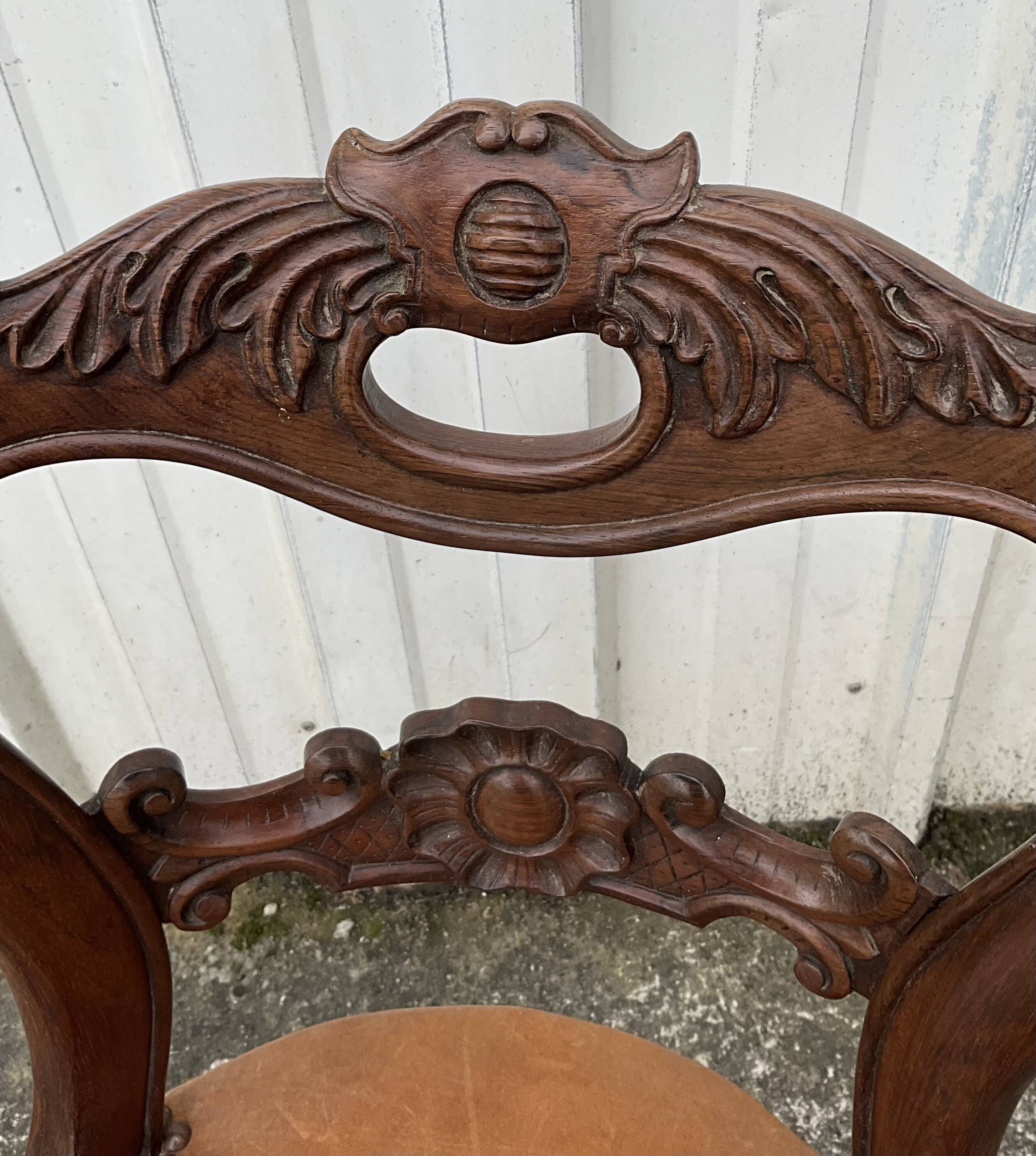 Mid-19th century solid walnut harpist's chair