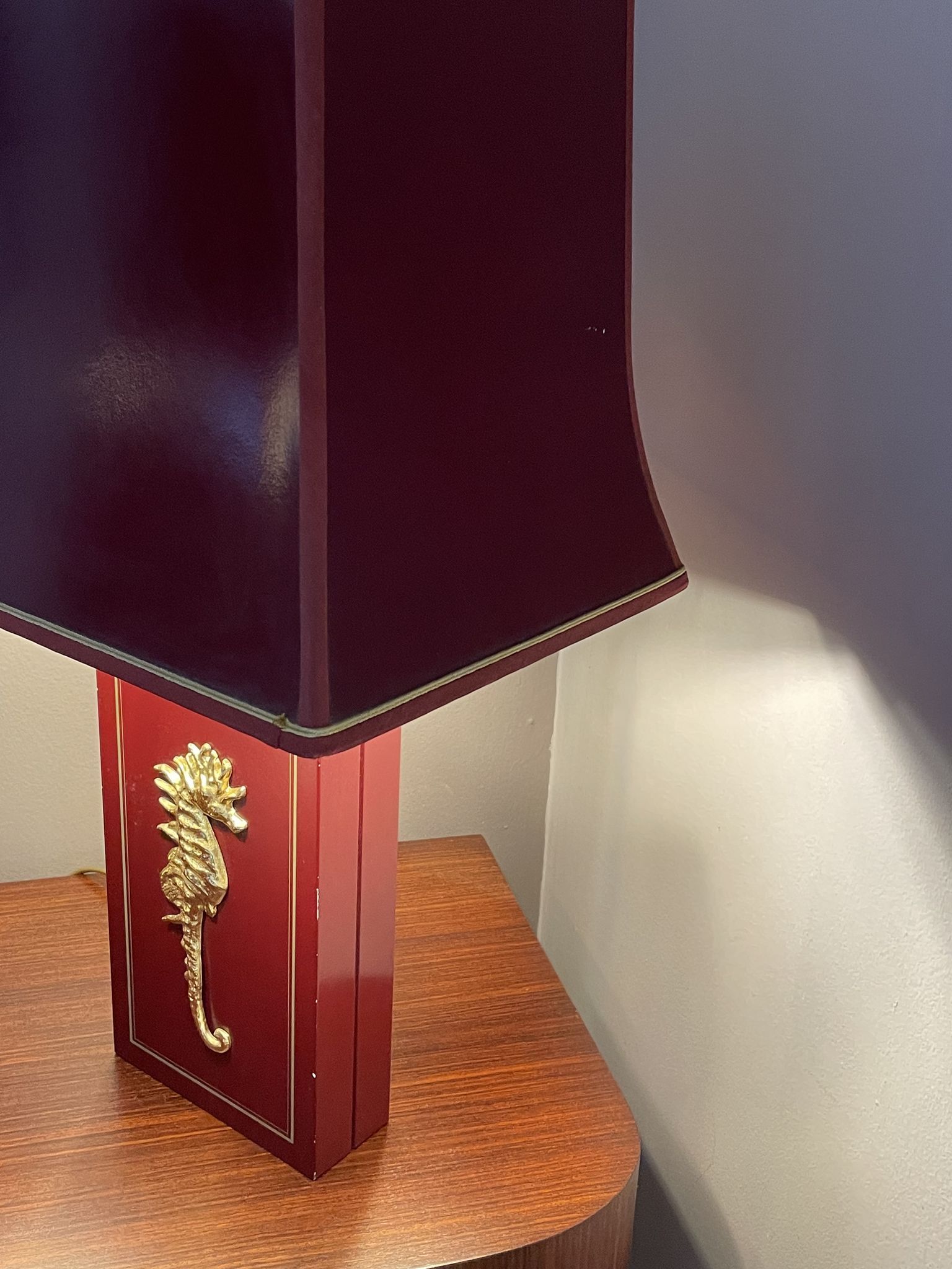 Pair of table lamps in Bordeaux lacquered wood and brass seahorse