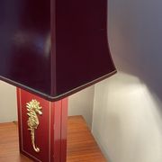 Pair of table lamps in Bordeaux lacquered wood and brass seahorse