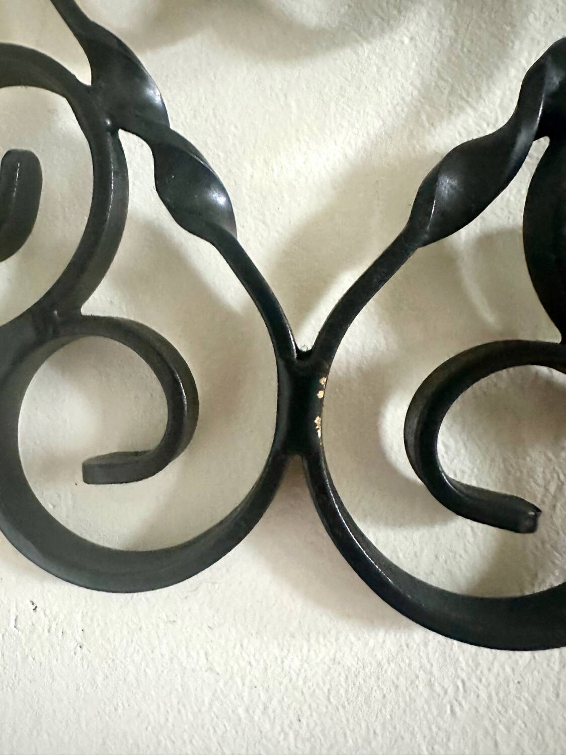 Old wrought iron coat rack