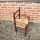 Old straw armchair for children