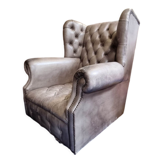 Fauteuil chesterfield en cuir gris