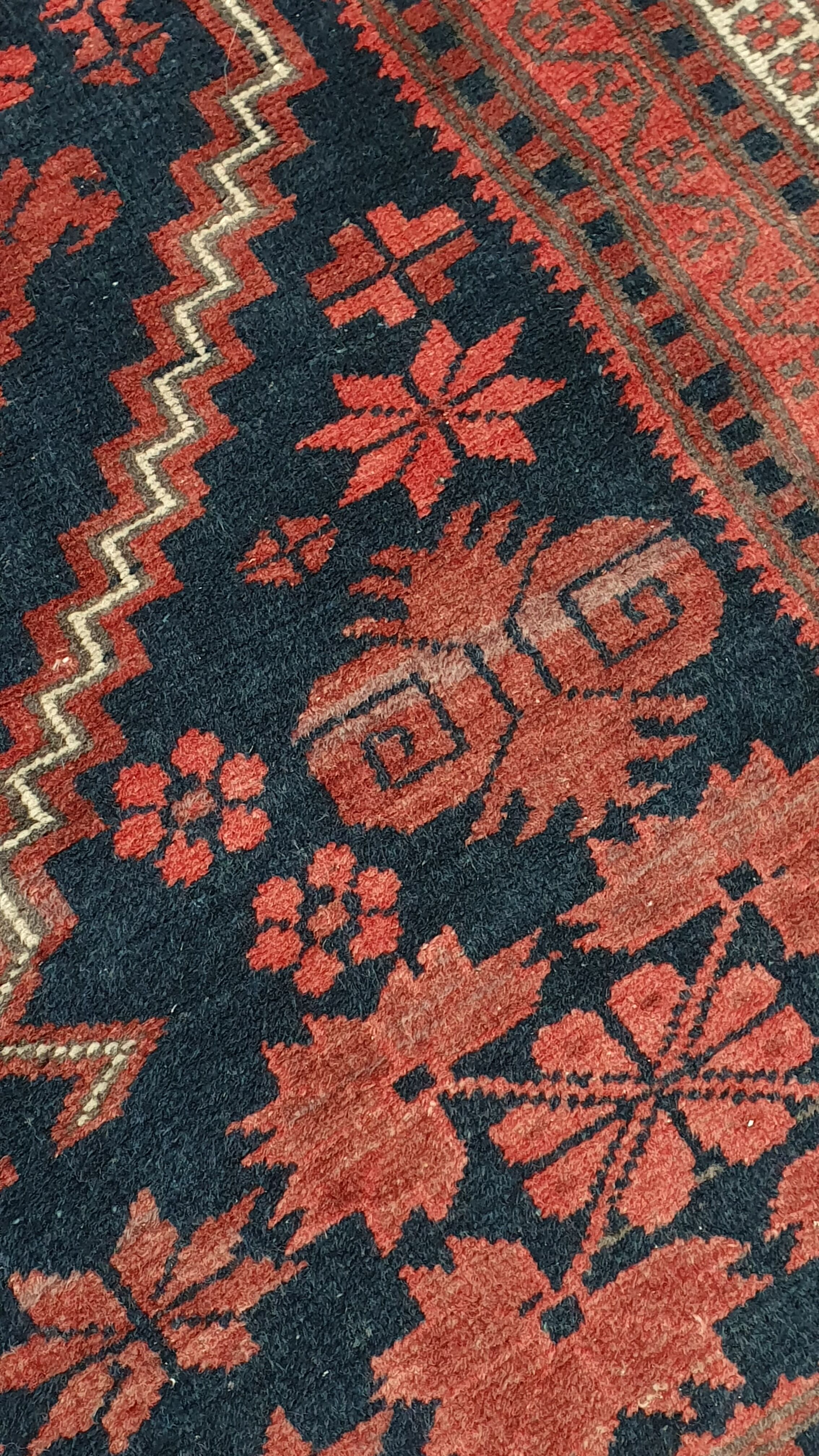 Old hand-knotted wool carpet