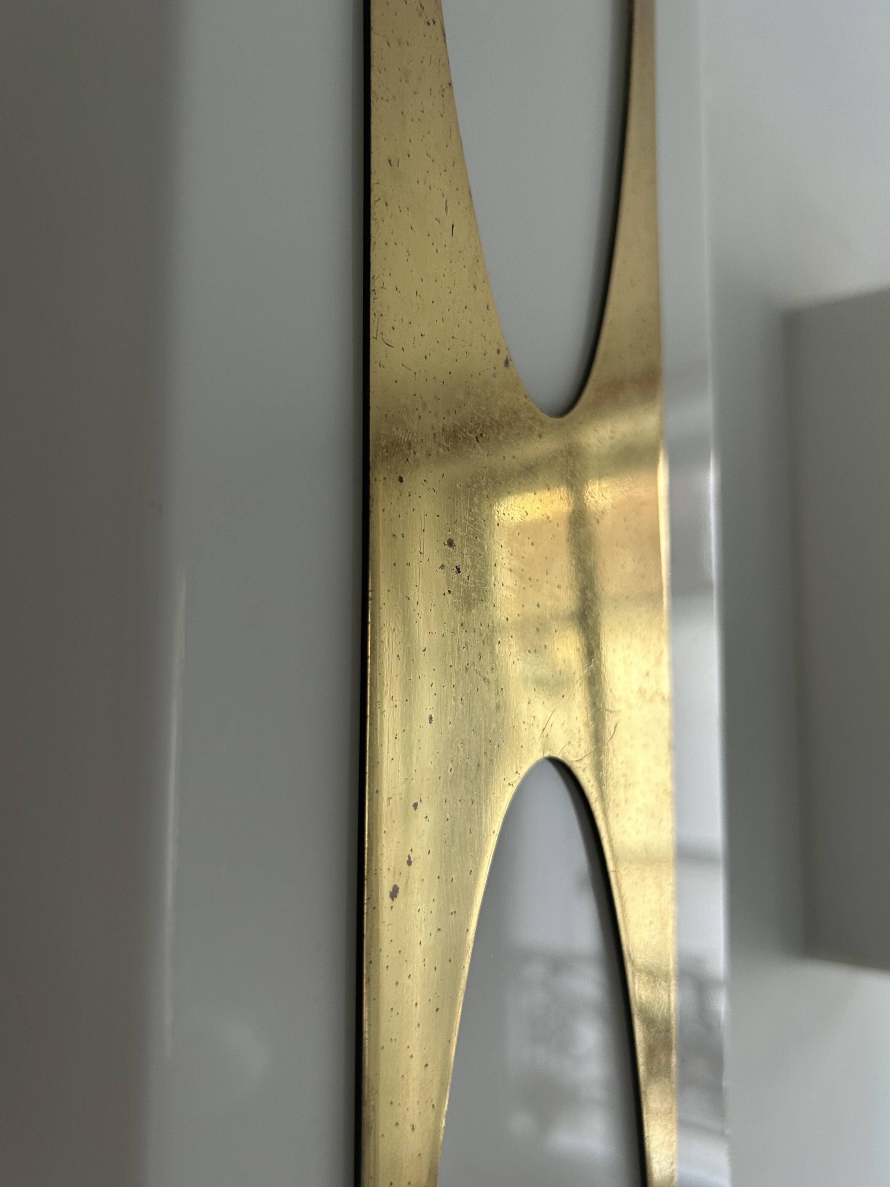 Pair of Loewy wall lights for Hilton, brass and Perspex, France 1965