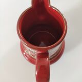 Red water pitcher and assorted plate
