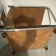 1970s/80s coffee table on casters with metal tubing, light-colored door