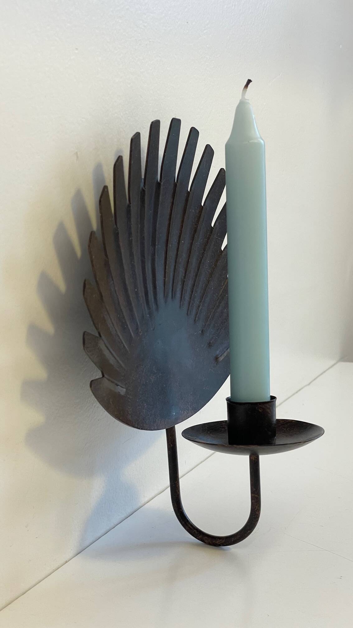 Brown patina wall candle holder