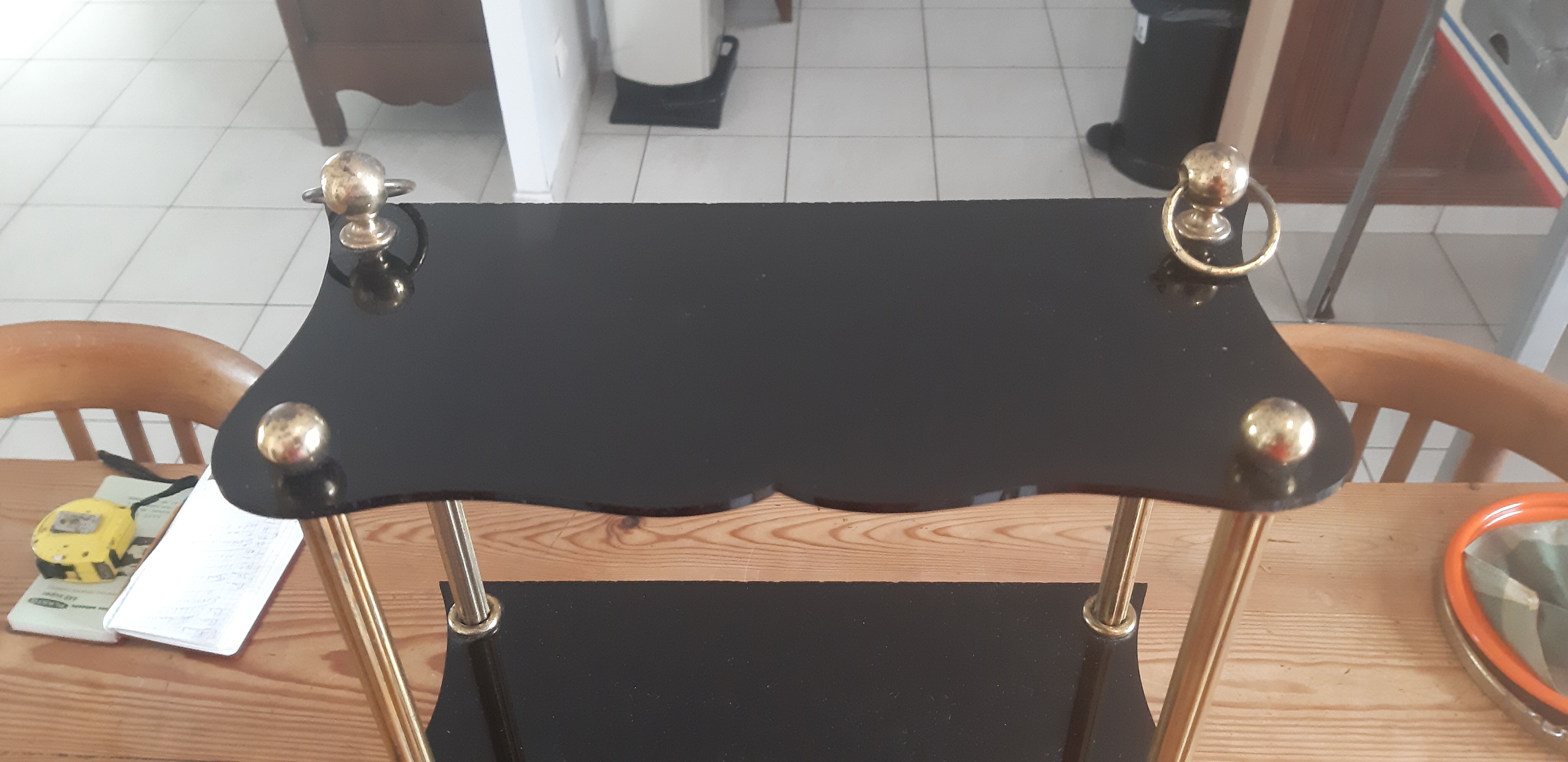 Vintage shelf of the 60s in golden metal and black plastic