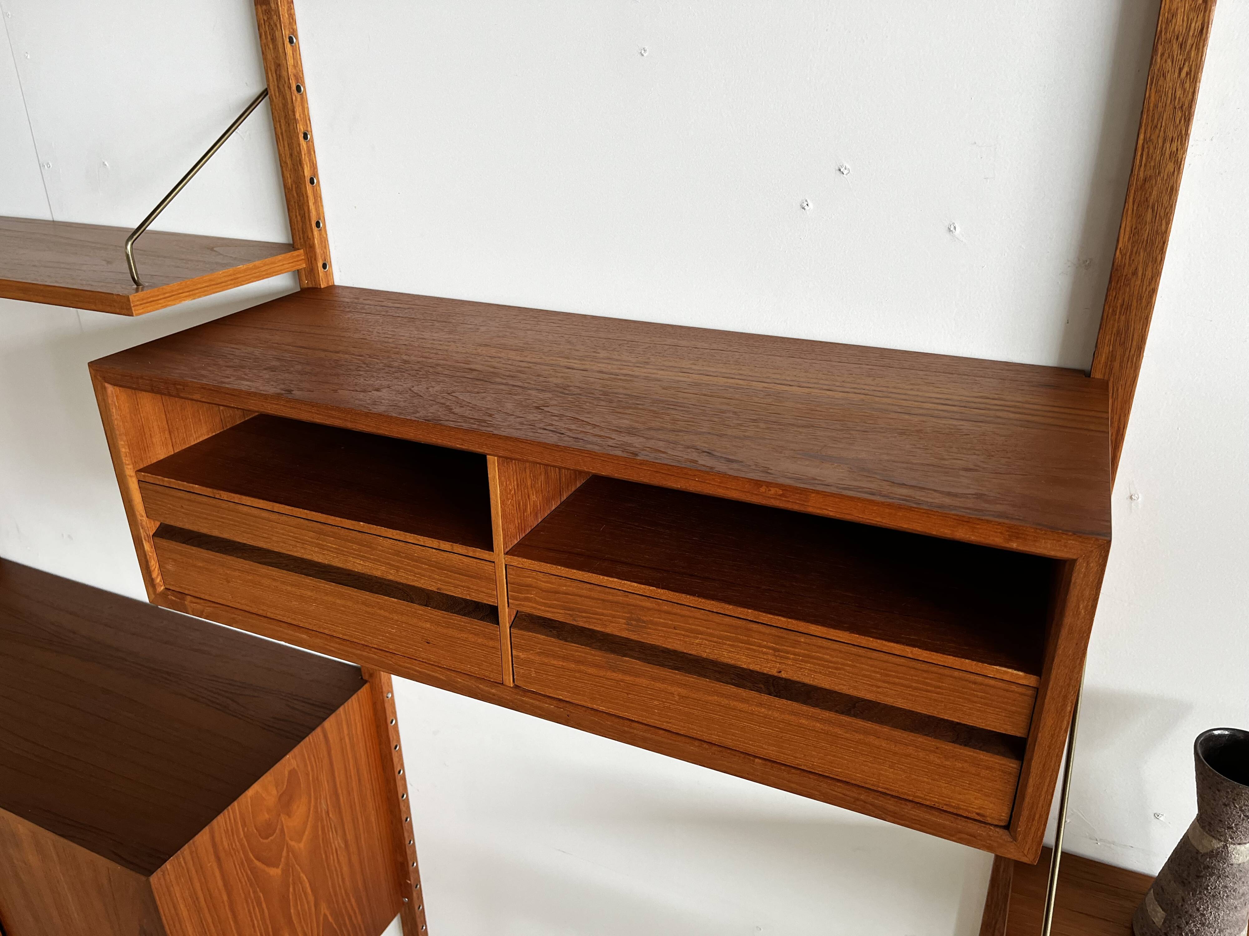 A wall unit with 4 compartments by Poul Cadovius, Denmark, 1960s.