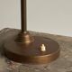 Art Deco table lamp in patinated brass from the 1930s.
