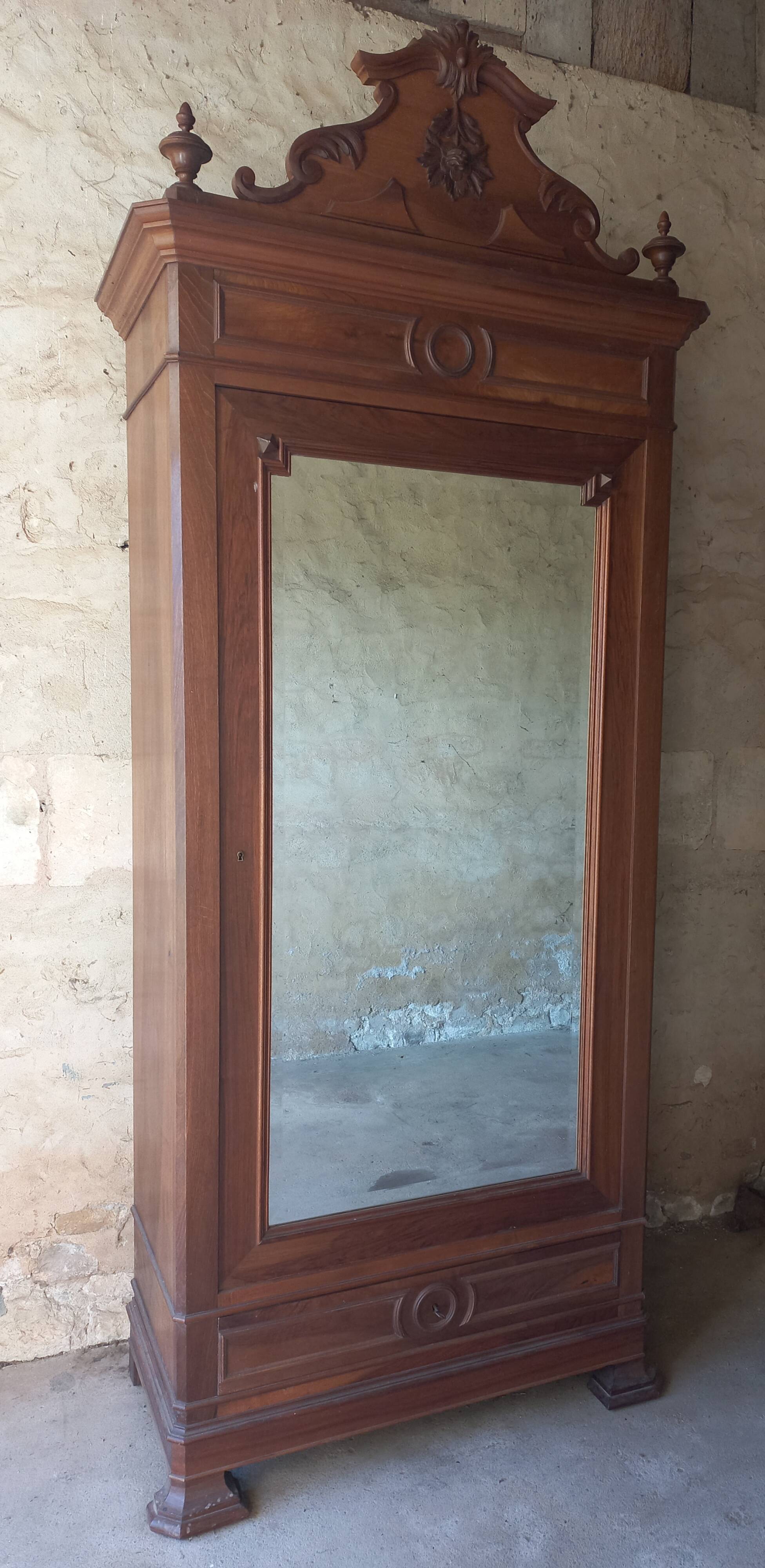 Superb Empire-style wardrobe in solid walnut.