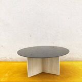 Coffee table in travertine and glass