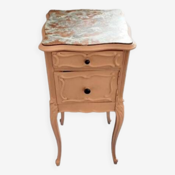 Old bedside table with moldings and marble