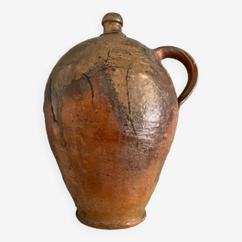 Large 19th century oil bottle in glazed earthenware
