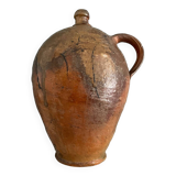 Large 19th century oil bottle in glazed earthenware