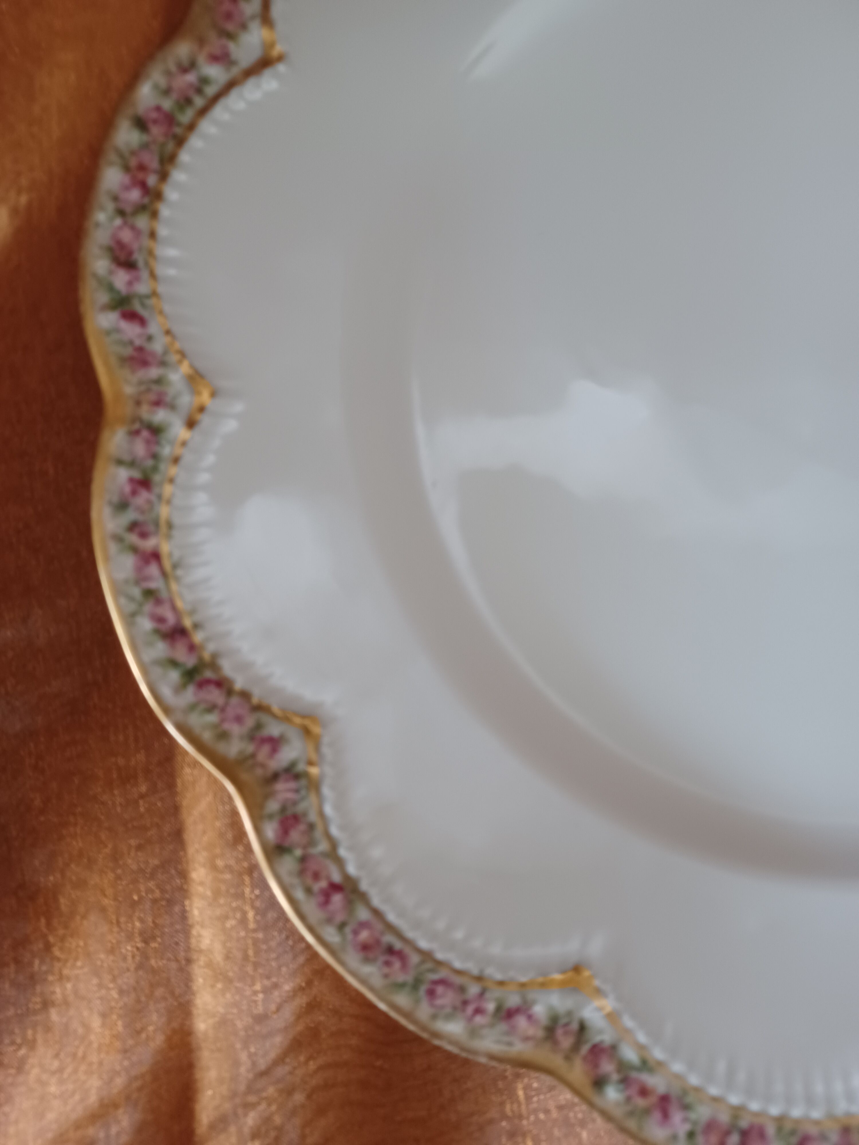 Haviland porcelain plate, contour decorations in floral garland.