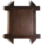 Rectangular mirror with bevelled wooden frame, 1970s.