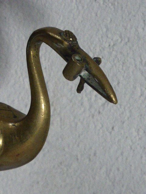Heron in brass on the back of a turtle, press paper, vintage 1970