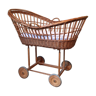 Rattan cradle on castors