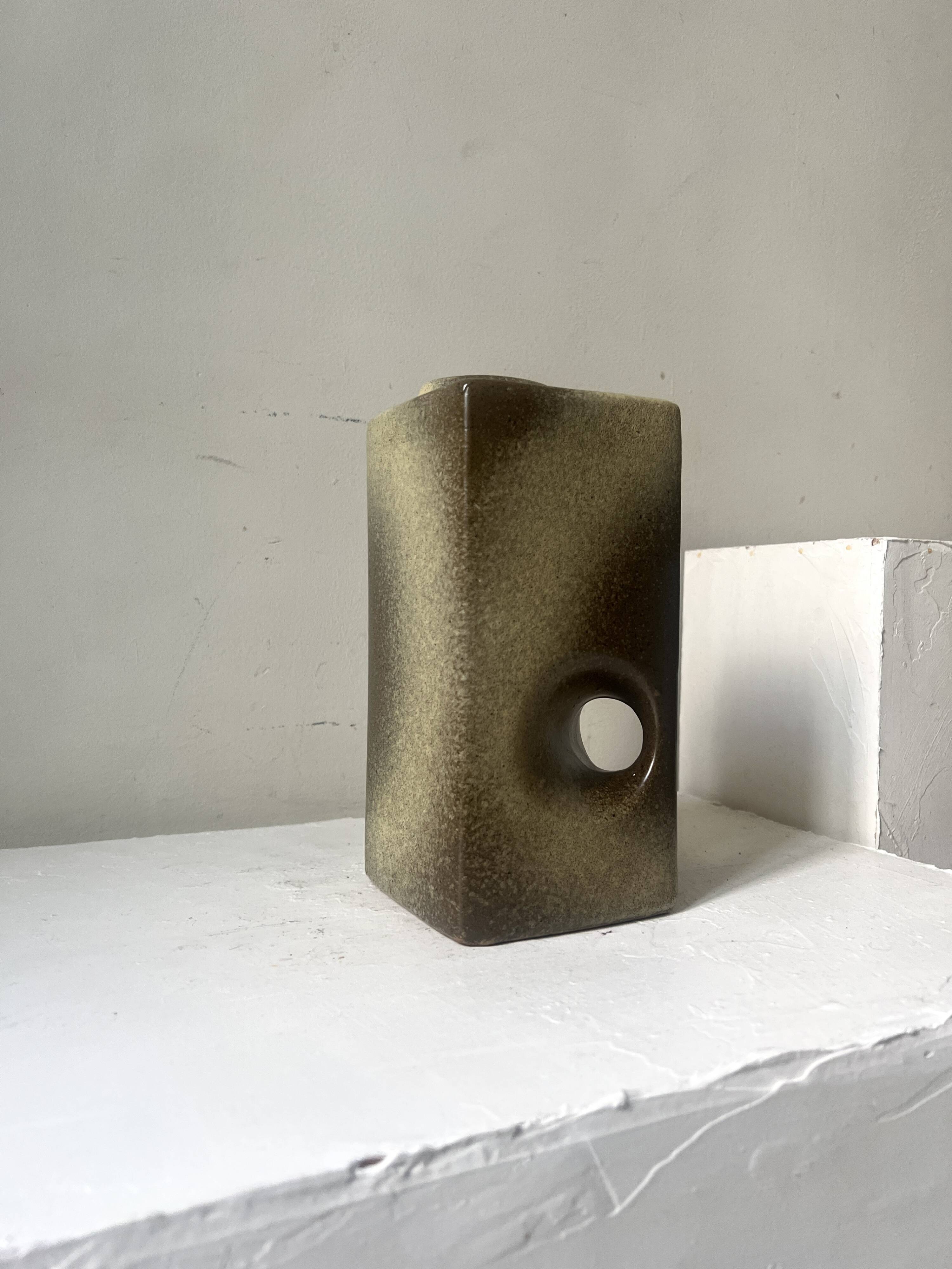 The modernist vase is German, VEB Haldensleben Fat Lava 1970.