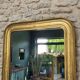 Antique mirror 86.5/69cm Louis-Philippe gilded with gold leaf, engraved decoration.