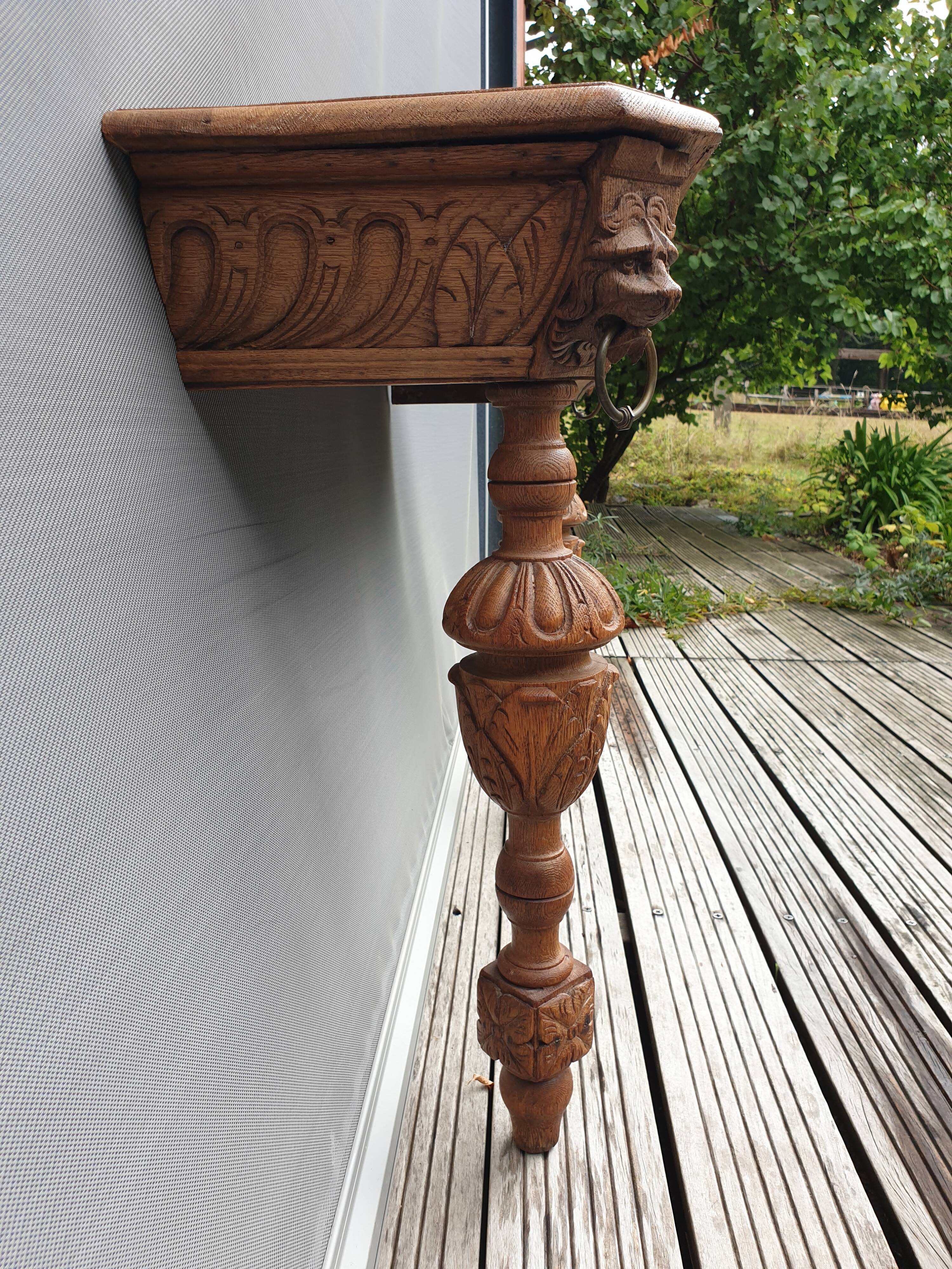 Neo-Gothic lion-headed applique console