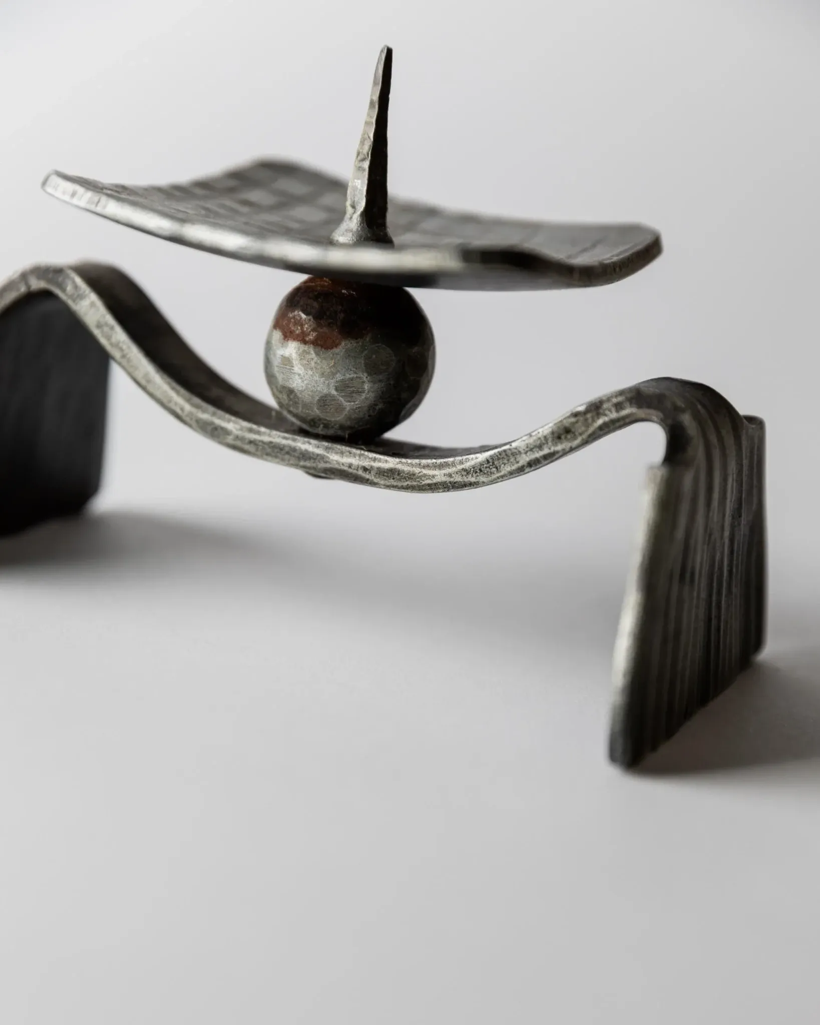 Vintage brutalist iron candlestick from the 1970s.