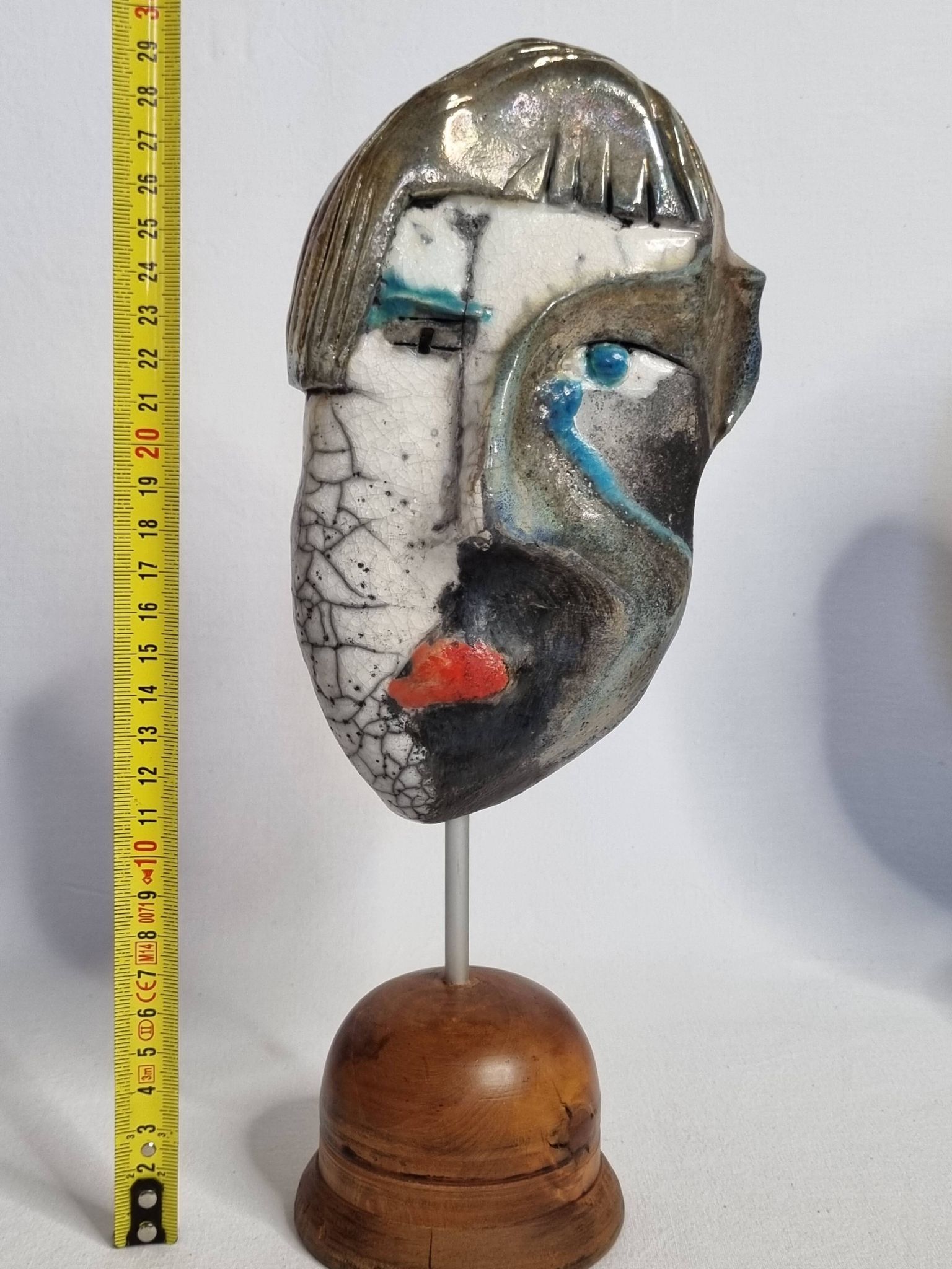 Signed raku ceramic mask on wooden base Contemporary sculpture 30 cm