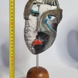 Signed raku ceramic mask on wooden base Contemporary sculpture 30 cm