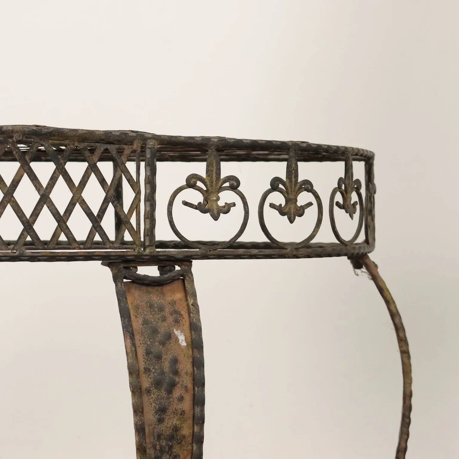 Old iron console painted with tin decorations, 20th century.