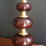 Lamp made of brass and red colored glass
