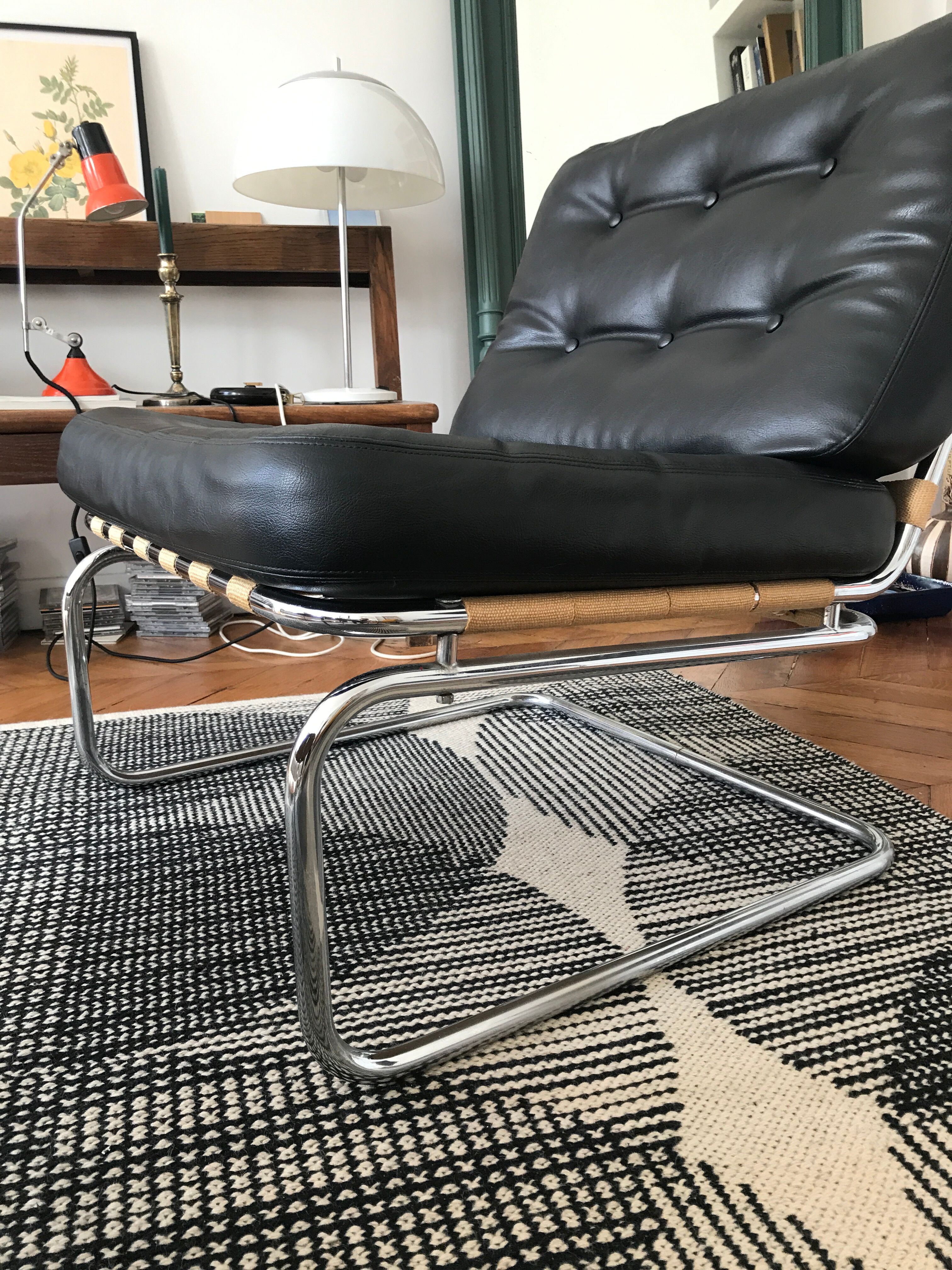 Chrome and leatherette armchair