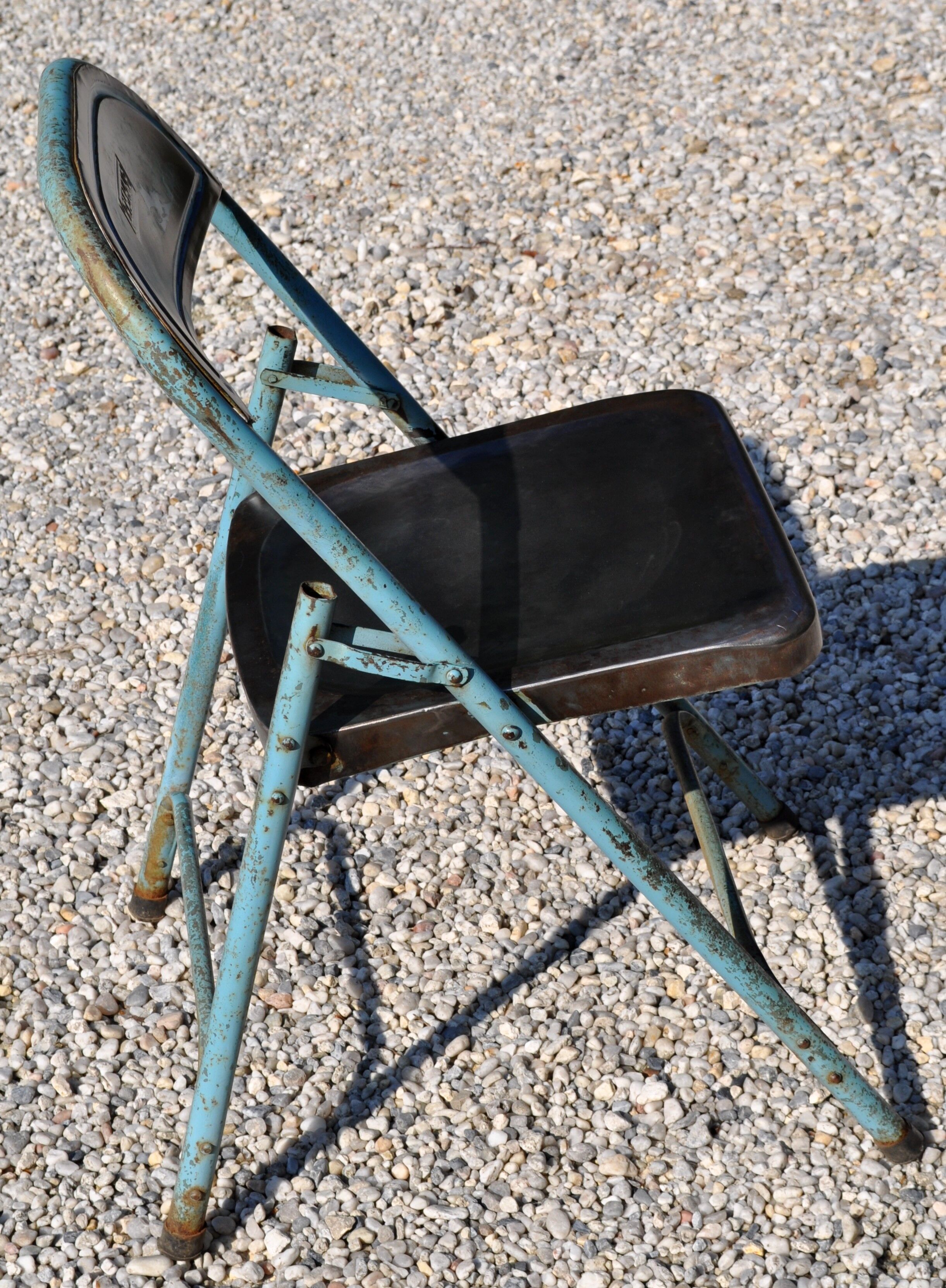 Unique folding metal chair