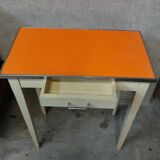Orange wood and formica table