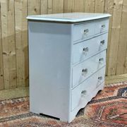 English chest of drawers painted in fir with glass knobs, 19th century