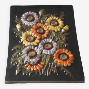 Old wall plaque with floral decoration