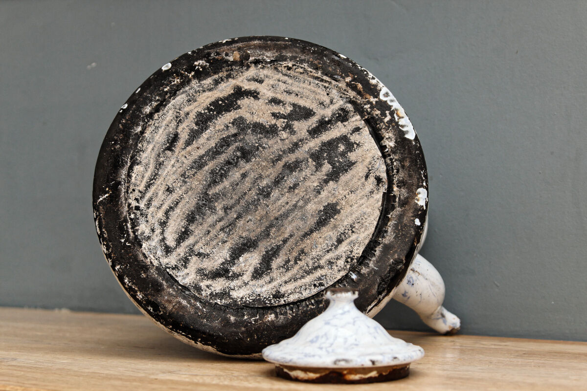 Old enamelled sheet metal kettle